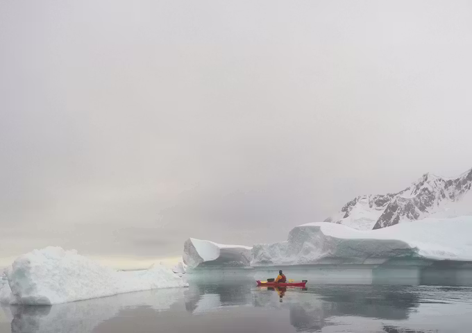 Kayaking amongst Antarctic icebergs