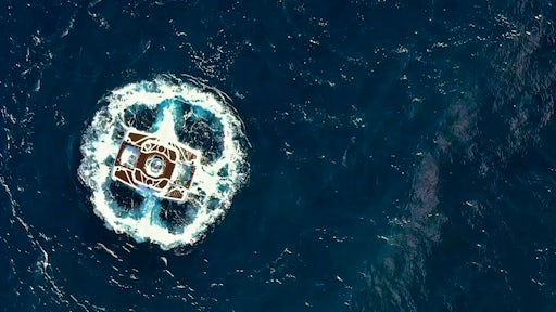 A submarine surfaces from the sea