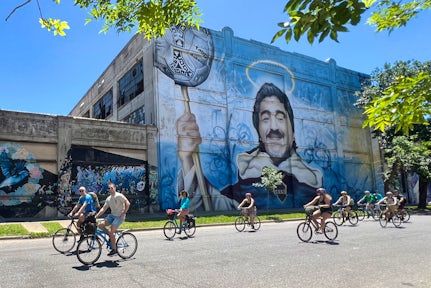 Bike tour of Buenos Aires with mural of Maradona