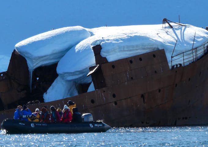 Zodiac cruising at the Governoren wreck in Foyn Harbour