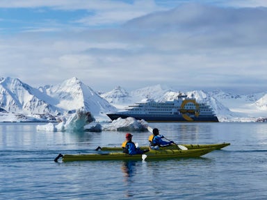 Kayaking in front of Ultramarine, Antarctic Vessel, Antarctica