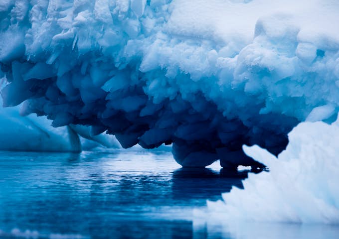 The myriad blue hues of an iceberg in Antarctica