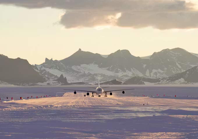 Plane landing on a snow runway in Antarctica